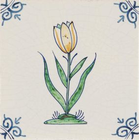 Hand-painted Delft tile sample with flowers in polychrome, decorated with ox-head corner motif