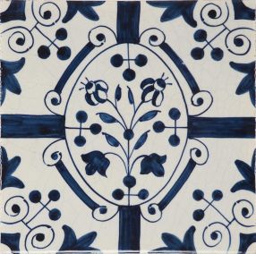 Hand-painted Delft tile sample depicting flower in oval border, decorated with fleur-de-lis corner motifs and Royal Charter motifs around the border
