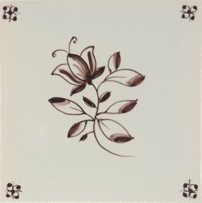 Hand-painted Delft tile sample with small flowers painted in manganese