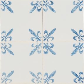 Decorative hand-painted Delft tiles with fleur-de-lis corner motifs in blue