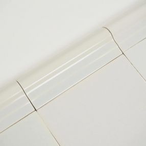 Plain white Delft trim tile by Poarte - Trim C - on the Grey mix