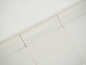 Plain white Delft trim tile by Poarte - Trim C - on the Grey mix