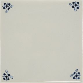 Hand-painted spider curl corner motif Delft tile sample, painted in blue, enhanced with pinholes