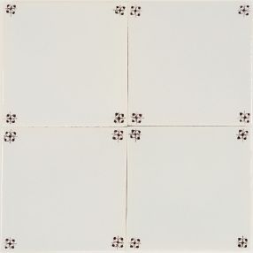 Classic hand-painted Delft tiles decorated with spider corner motifs in manganese