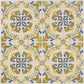 Antique Delft ornament wall tiles by Van Hulst, Harlingen, featuring a repeating floral motif in blue, yellow and green, early 20th century