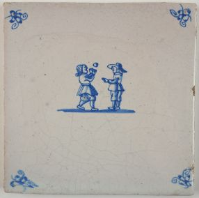 Antique Delft tile with two children playing with a ball, 18th century