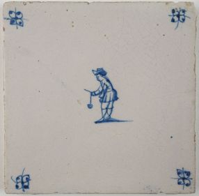 Antique Delft tile with a child playing the brick game, 18th century