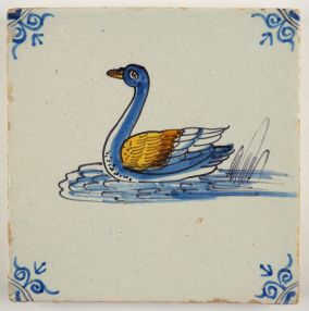 Antique Delft tile with a polychrome swan in the water, 17th century