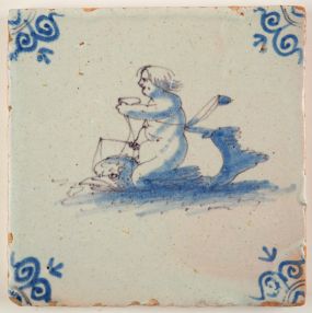 Antique Delft tile with putti riding on the back of a dolphin, 17th century