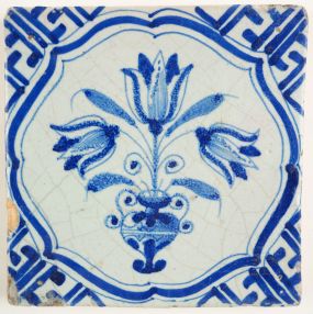 Antique Delft tile with tulips in blue, 17th century