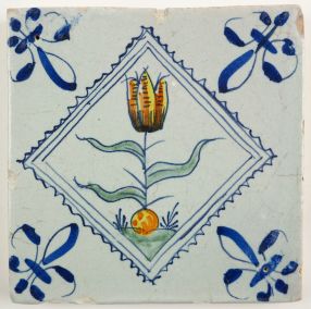 Antique Delft tile with a colorful tulip, 17th century