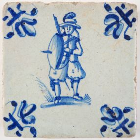 Antique Delft tile with a guard, 17th century