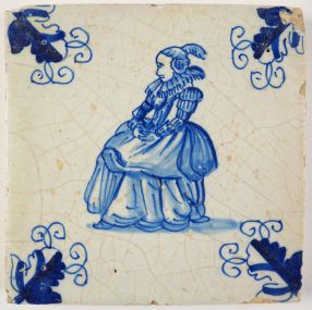 Antique Delft tile with a lady on a chair, 17th century