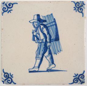 Antique Delft tile with a thatcher, 18th century