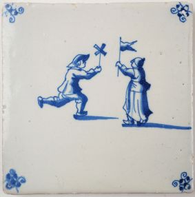 Antique Delft tile with two children playing, 17th century