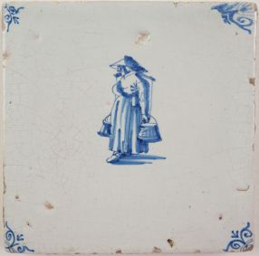 Antique Delft tile with a woman carrying a yoke, 17th century