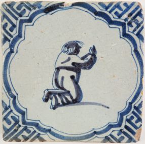 Antique Delft tile with a monk, 17th century
