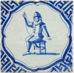 Antique Delft tile depicts a tailor, 17th century