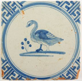 Antique Delft tile with a swan in blue, 17th century