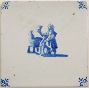 Antique Delft tile with a woman celebrating life, 17th century