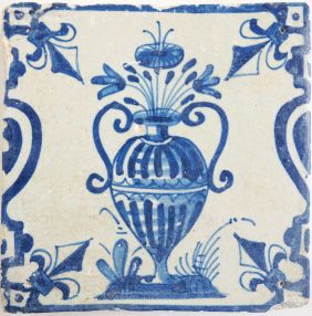 Antique Delft tile with a flower vase in blue, 17th century