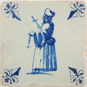 Antique Delft tile with a priest in blue, 17th century