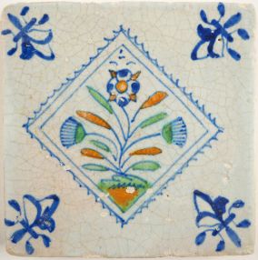 Antique Delft tile with flowers, 17th century