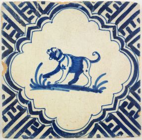 Antique Delft tile with a dog, 17th century