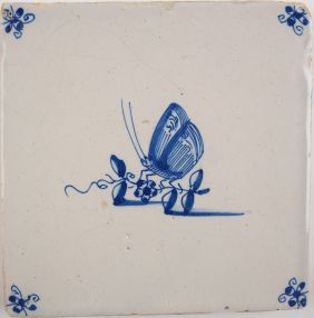 Antique Delft tile with a butterfly, 17th century