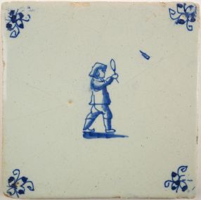 Antique Delft tile with a ball game, 17th century