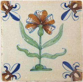 Antique Delft tile depicts a carnation, 17th century