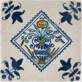 Antique Delft tile with a flowerpot, 17th century