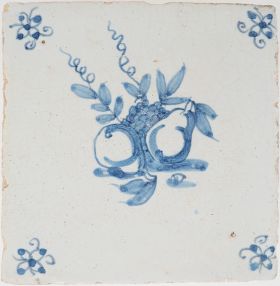 Antique Delft tile with a still life of pears and grapes, 17th century