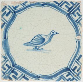 Antique Delft tile with a bird, 17th century