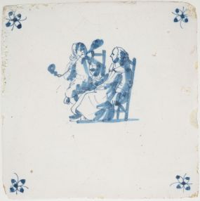 Antique Delft tile with pipe smokers, 17th century