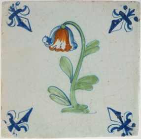Antique Delft tile with a campanula flower, 17th century