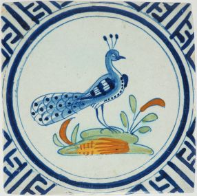 Antique Delft tile with a peaock, 17th century
