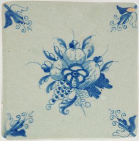Antique Delft tile with a diverse selection of fruits, 17th century