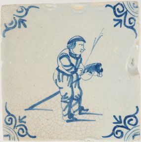 Antique Delft tile with a hobby horse, 17th century