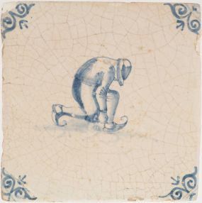 Antique Delft tile with an ice skater, 17th century