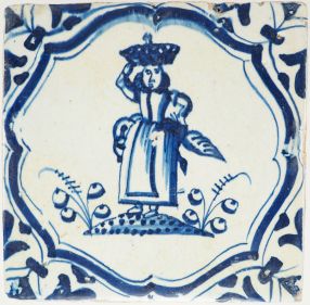 Antique Delft tile with a woman carrying game, 17th century
