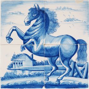 Antique Delft tile mural in blue with a prancing horse, 19th century