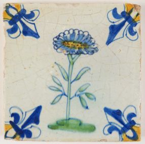Antique Delft polychrome tile with a Daisy flower, 17th century Gouda