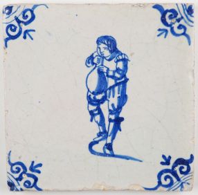 Antique Delft tile with a child blowing up a pig blatter balloon, 17th century