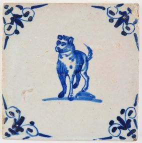 Antique Delft tile with a curious dog in blue, 17th century