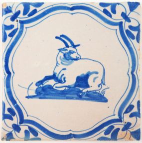 Antique Delft tile in blue with a billy goat resting, 17th century