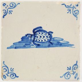 Antique Delft tile in blue depicting a turtle swimming in water, 17th century