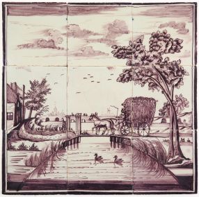 Antique Delft tile mural in manganese with a farmer brining in the hay, 19th century
