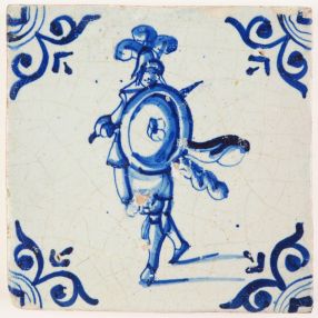 Antique Delft tile with an agile looking soldier wielding his sword and shield, 17th century