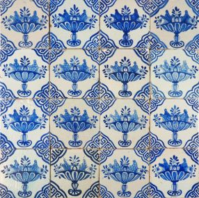 Antique Delft wall tiles with fruit bowls in blue decorated with Wanli inspired corner motifs, 17th century